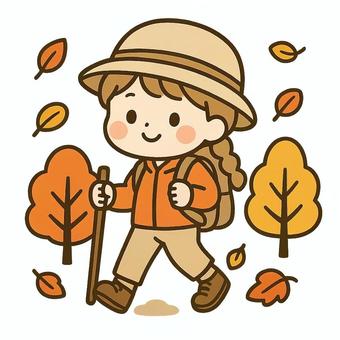 秋のハイキングを楽しむ女の子