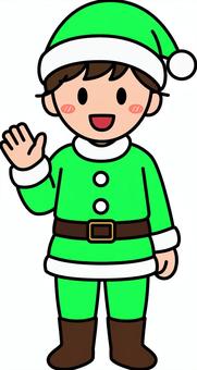 緑のサンタコスの男の子です。