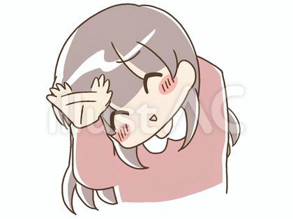 首を傾げながら笑顔で手を振る女性