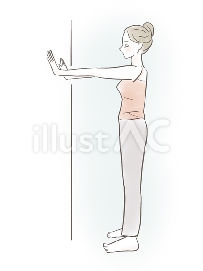 壁を使ってストレッチする女性
