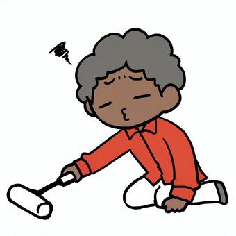 コロコロをかける不満なアフロ男性 アフロ,コロコロ,掃除,不満,いやいや,不本意,やりたくない,義務,役割,趣味のイラスト素材