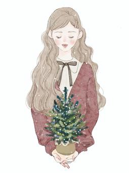 小さなクリスマスツリーを持つ女の子 女の子,女性,女の子イラスト,クリスマス,クリスマスツリー,クリスマスイラスト,冬,12月,水彩風,手描きのイラスト素材