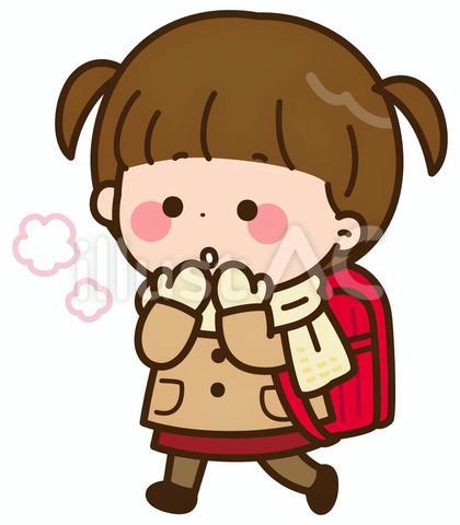 寒そうに歩くランドセルを背負った女の子