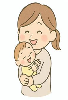 幸せそうに赤ちゃんを抱っこする女性