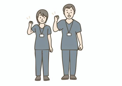 ガッツポーズの医療スタッフ（夜間） 夜間,救急,医療,スタッフ,医師,看護師,ドクター,ナース,スクラブ,ユニフォームのイラスト素材