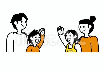 手を振り挨拶を交わす子どもたちとその親
