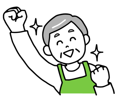 ガッツポーズするエプロン姿のシニア男性