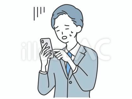 スマホを見て絶望するビジネスマン