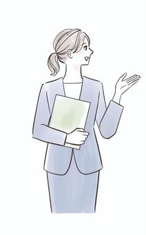 手で指し示すスーツ姿の女性 人物,女性,笑顔,こちら,手,案内,説明,見せる,指す,示すのイラスト素材