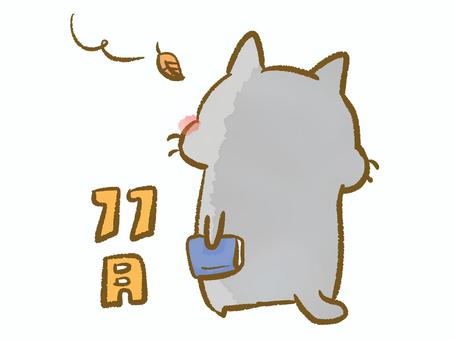 11月 11月,秋,猫,本,読書,枯葉,風,眺める,見る,手書き文字のイラスト素材