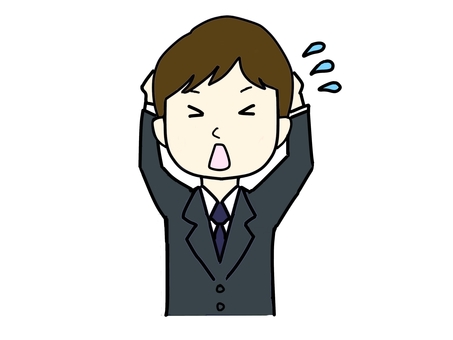 頭をかかえて慌てる男性
