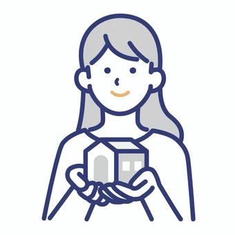 家を持つ女性のイラスト 女性,家,住宅,建物,暮らし,住居,マイホーム,保険,サポート,守るのイラスト素材