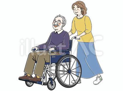 車椅子に乗るシニア男性と押すシニア女性