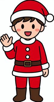 赤のサンタコスの男の子です。