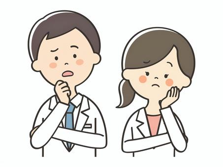 悩む白衣の男女 悩む,困る,不安,考える,心配,わからない,疑問,不満,医者,医師のイラスト素材