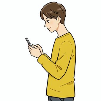 スマホを見る姿