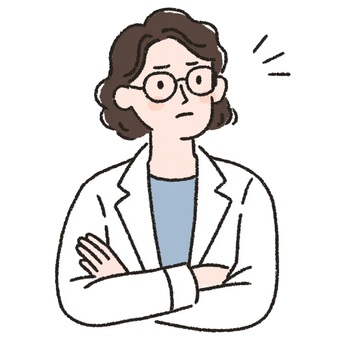 腕を組んで考える女性