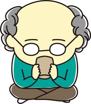 お茶を飲むおじいさん