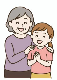 敬老の日に笑顔で過ごす祖母と孫