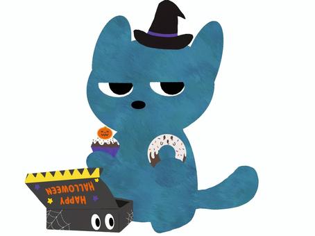 ハロウィン仕様のお菓子を食べる青猫