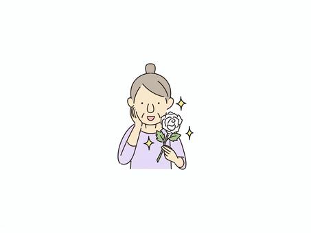白い薔薇をもらうおばあちゃん 白い薔薇,プレゼント,感動,おばあちゃん,ほっこり,家族愛,癒し,幸せ,思いやり,感謝のイラスト素材