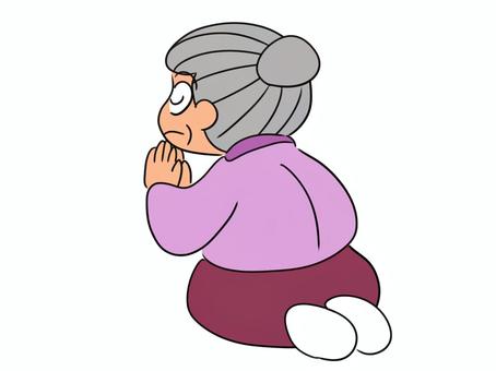 拝むおばあさんのイラスト