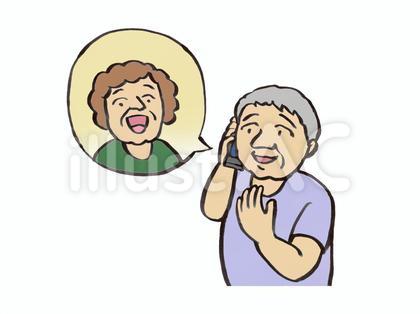 友人と電話で話すおばあさん