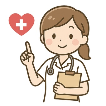 笑顔で指差しする女性看護師