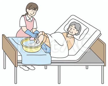 足洗浄する介護・看護女性