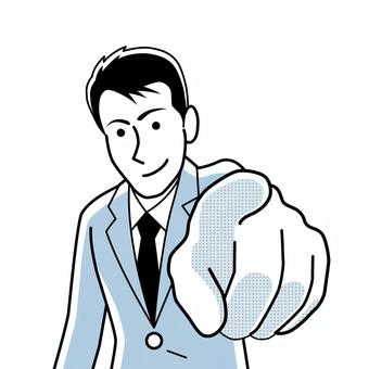 正面に向かって指差す男性