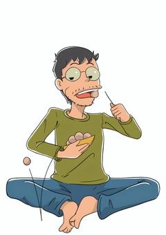 あぐらで物を食べる男