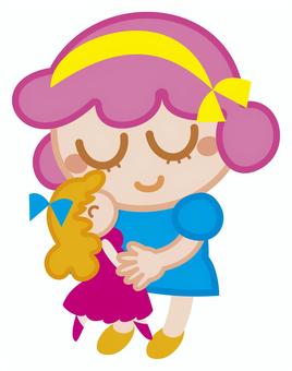 人形を持つこども