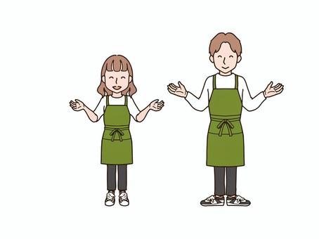 両手を広げる男女_エプロンgr 大人,男性,男女,女性,ペア,おそろい,全身,エプロン,ズボン,パンツのイラスト素材