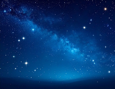 深い青に無数の星が輝く幻想的な宇宙空間