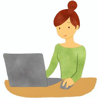 A woman who operates a personal computer A woman who operates a personal computer