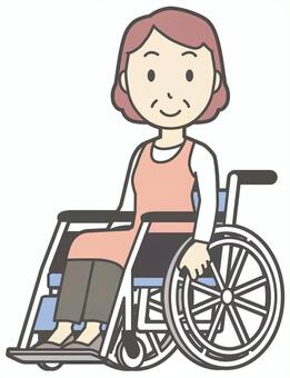  車椅子に乗っているエプロンの中年女性 車椅子,おばさん,人,女性,中年,おばちゃん,シニア,ママ,主婦,ヘルパーのイラスト素材
