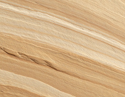 ベージュと茶色が混じった砂石のテクスチャ