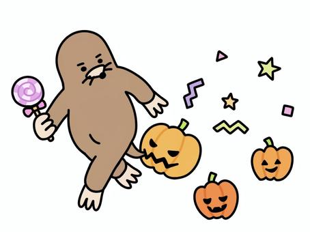 かぼちゃに噛みつかれるもぐら かぼちゃ,噛みつく,しっぽ,ハロウィン,ペロペロキャンディー,持つ,もぐら,手描き,ゆるい,かわいいのイラスト素材