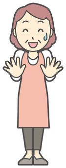  手を振ってごまかしているおばさん 作り笑い,女性,人,主婦,中年,シニア,エプロン,ママ,お母さん,おかんのイラスト素材