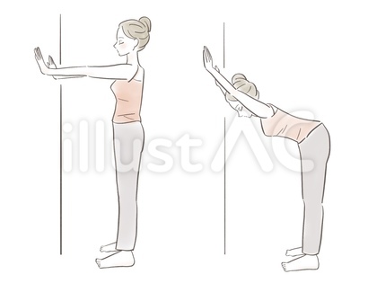 壁を使ってストレッチをする女性