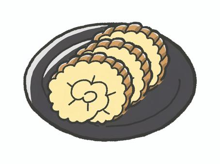 黒いお皿に盛りつけた伊達巻 伊達巻,おせち,正月,縁起物,料理,食べ物,黄色,卵料理,練り物,和食のイラスト素材