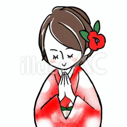 参拝する着物女性
