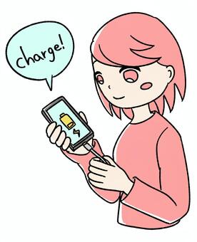 桃色の女の子がスマホを充電している ピンク,かわいい,手描き,スマホ,スマートフォン,充電,充電中,バッテリー不足,低電力,デバイスのイラスト素材