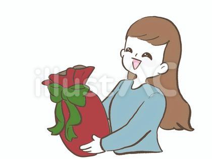 クリスマスプレゼントを笑顔で渡す女性