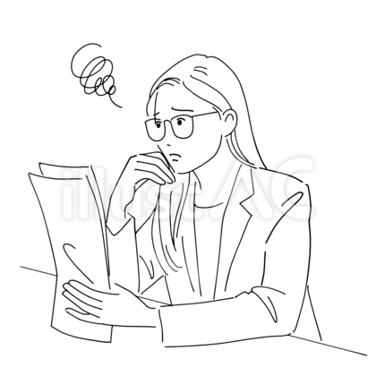 書類を見て悩んでいる会社員女性