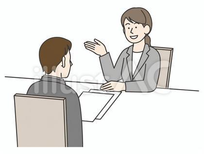 打ち合わせ説明するスーツ女性