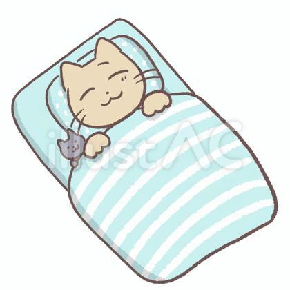 布団で気持ちよく寝る猫