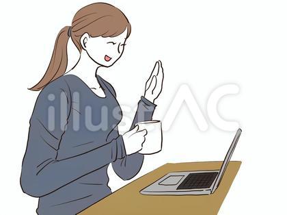 テレビ電話で会議をする女性