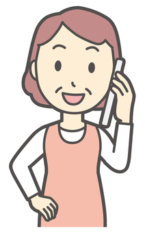 スマホで電話をかけているおばさん 通話,女性,人,主婦,中年,シニア,エプロン,ママ,お母さん,おかんのイラスト素材