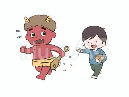 豆まきをする子供